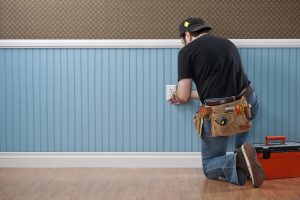 Gravity Electrical Calgary handyman working in empty room